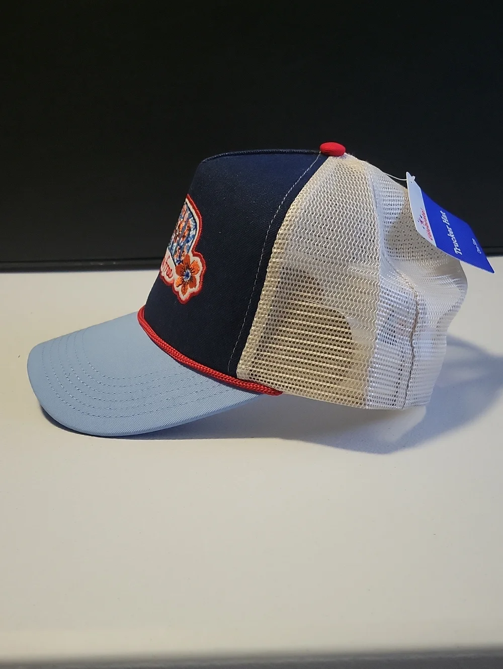 Patriotic Floral Patch Trucker Hat - Navy, Light Blue & Cream. T21